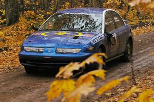 Micah Witala / Jason Takkunen Saturn SL2 slows down after crossing the finish of SS7, Gratiot Lake 1.