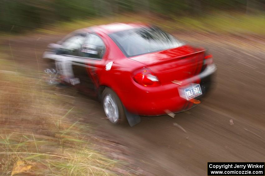 Sans Thompson / Craig Marr Dodge Neon ACR heads uphill near the start of SS1, Herman.