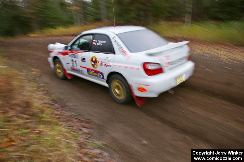 Yurek Cienkosz / Lukasz Szela Subaru Impreza RS heads uphill near the start of SS1, Herman.