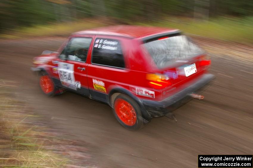 Dave Grenwis / Dan Goldman VW GTI heads uphill near the start of SS1, Herman.