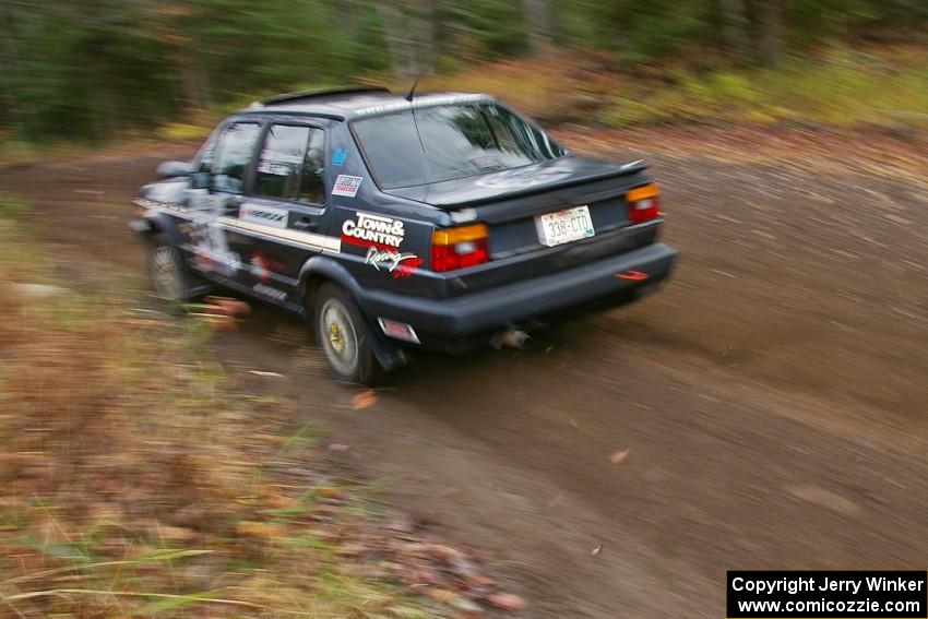 Mike Merbach / Jeff Feldt VW Jetta heads uphill near the start of SS1, Herman.