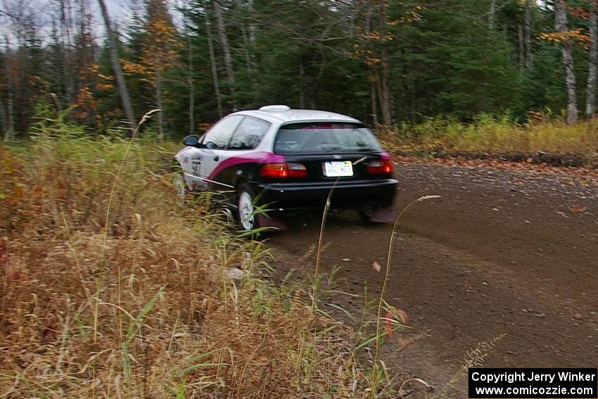 Matt Johnston / Alex Kihurani Honda Civic heads uphill near the start of SS1, Herman.