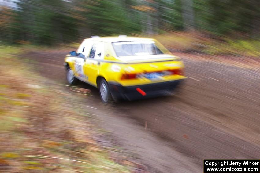 Eric Mozer / Jay Efting	Alfa Romeo Milano heads uphill near the start of SS1, Herman.