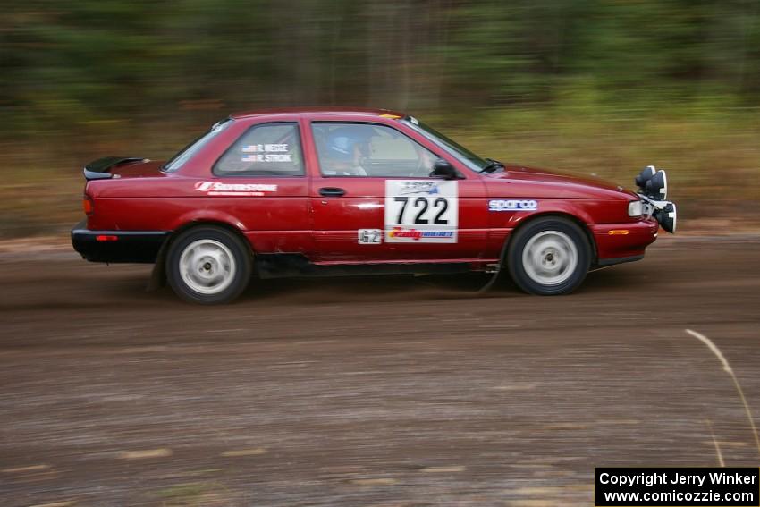 Ross Wegge / Rob Stroik Nissan Sentra SE-R heads uphill near the start of SS1, Herman.