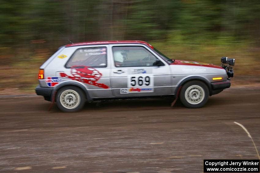 John Hruska / Eric Kokkonen VW GTI heads uphill near the start of SS1, Herman.