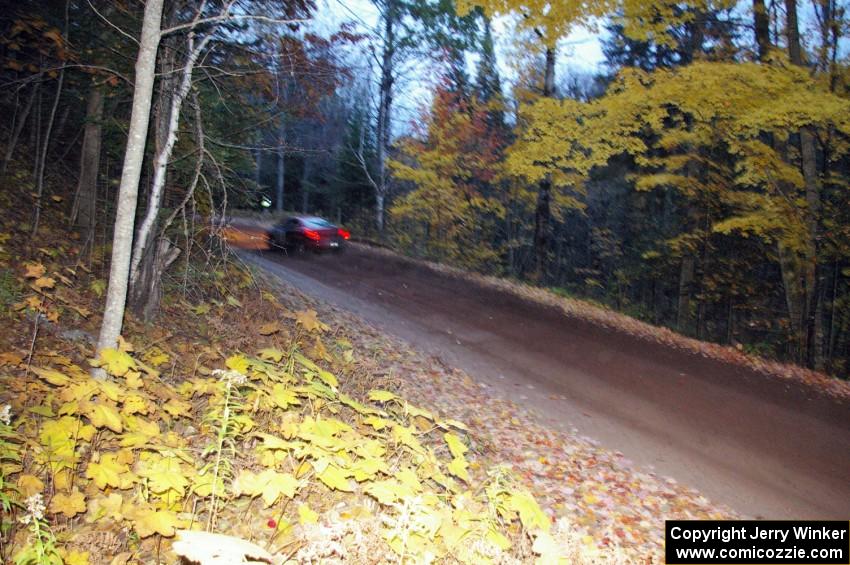 Sans Thompson / Craig Marr Dodge Neon ACR at speed near the end of Menge Creek North, SS2.