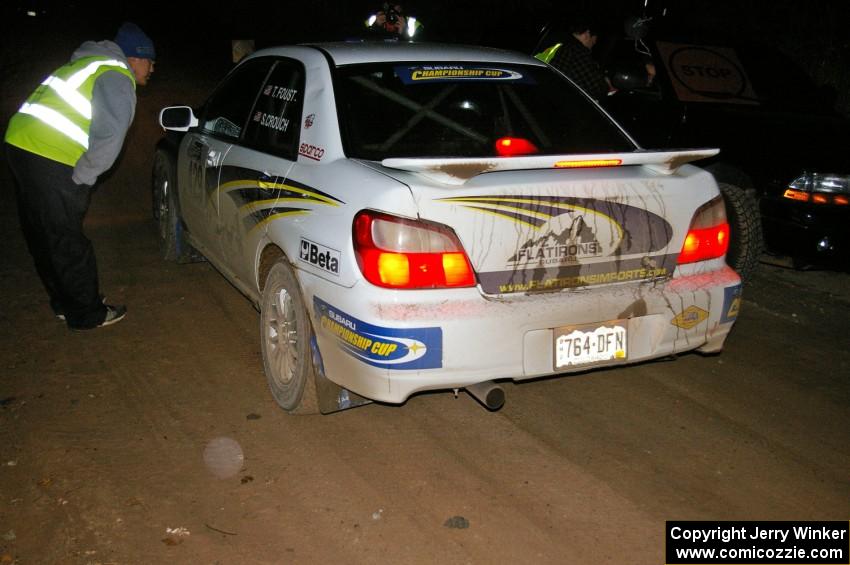 Tanner Foust / Scott Crouch in their Subaru WRX at the finish control of SS4, Baraga Plains.