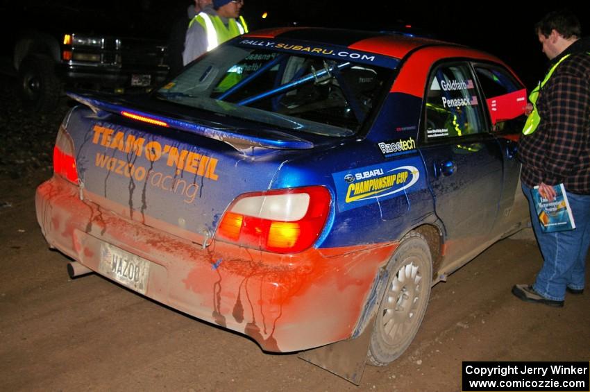 Tim Penasack / Marc Goldfarb hand in their time card at the finish of Baraga Plains, SS4, in their Subaru WRX.