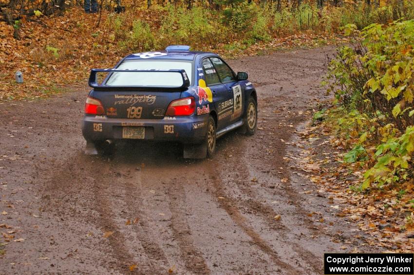 Travis Pastrana / Christian Edstrom Subaru WRX STi takes a wider line through the final corner of SS7, Gratiot Lake 1.