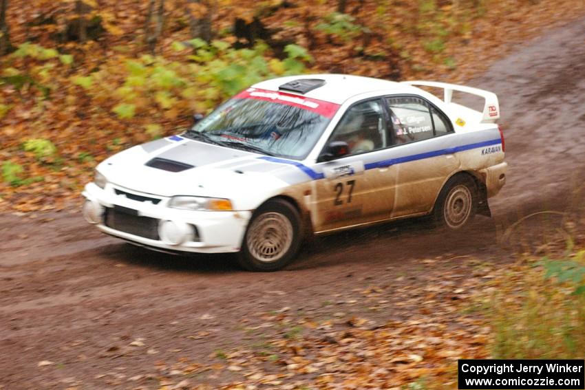 Chris Gilligan / Joe Petersen Mitsubishi Lancer Evo IV sets up for the final hard right at the finish of Gratiot Lake 1, SS7.