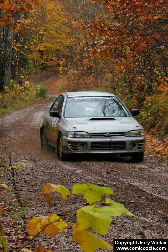 Russ Hodges / Mike Rossey Subaru Impreza at speed in the final uphill Section Of Gratiot Lake 1, SS7.