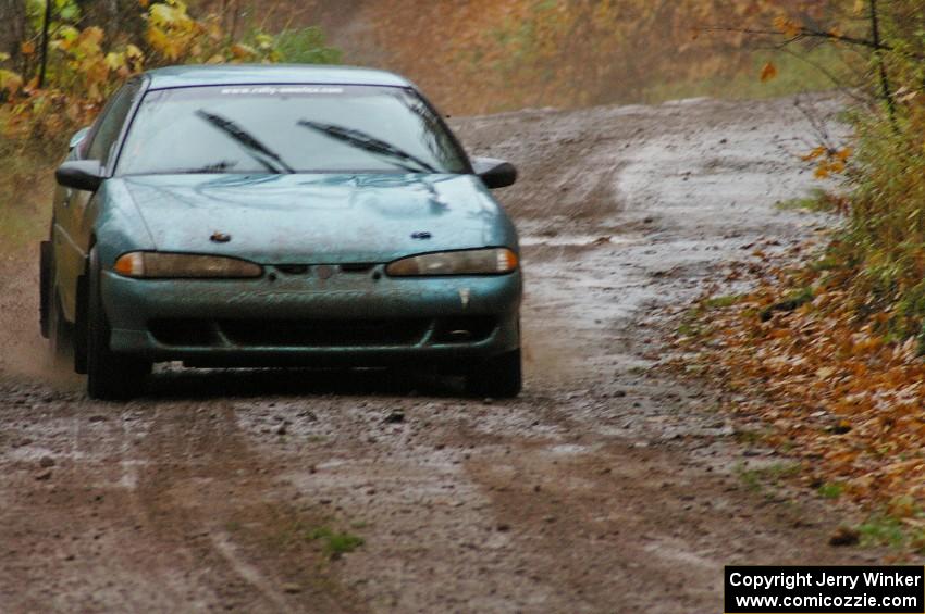 Adam Markut / John Nordlie race uphill in their Eagle Talon TSI before the finish of Gratiot Lake 1, SS7.