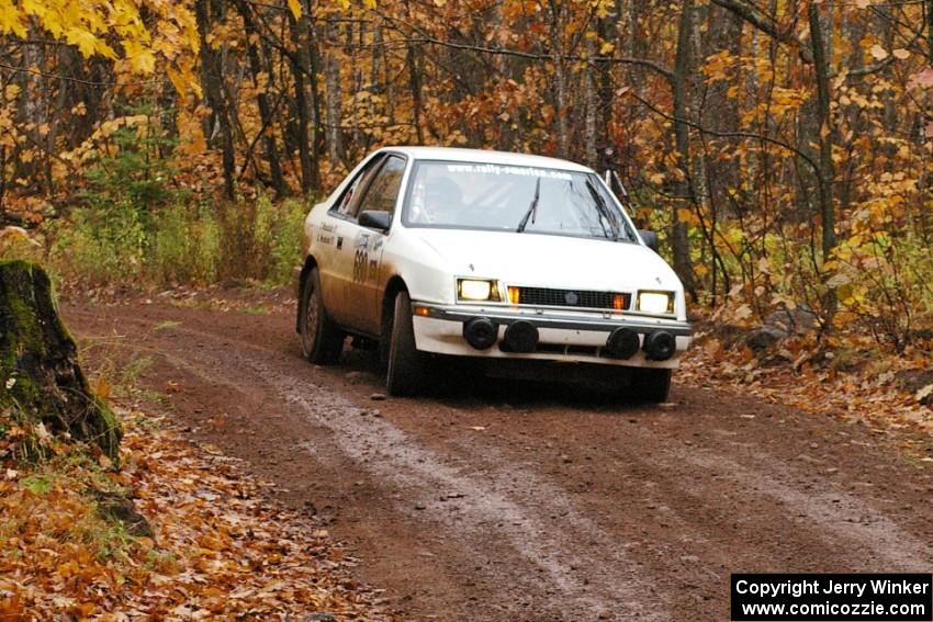 Greg Woodside / Tom Woodside Dodge Shadow Turbo drifts wide through the final corner of Gratiot Lake 1, SS7.