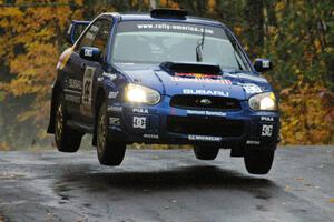 Travis Pastrana / Christian Edstrom Subaru WRX STi catches decent air at the midpoint jump on Brockway, SS10.