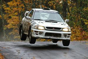 Matt Iorio / Ole Holter Subaru Impreza catches decent air at the midpoint jump on Brockway, SS10.