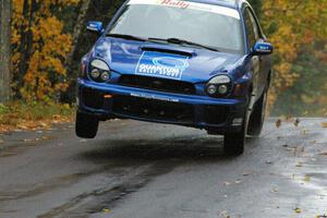 Mark McElduff / Damien Irwin Subaru WRX STi at the midpoint jump on Brockway, SS10.