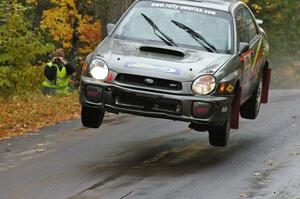 Dave Anton / Alan Ockwell Subaru WRX STi gets a bit crooked before landing at the midpoint jump on Brockway, SS10.