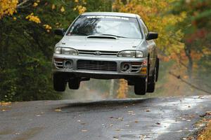 Russ Hodges / Mike Rossey Subaru Impreza catches nice air at the midpoint jump on Brockway, SS10.