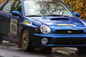 Tim Stevens / Jeff Hagan Subaru WRX takes it easy at the midpoint jump on Brockway, SS10.