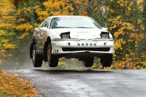 Matt Huuki / Brent Nahri catch some air in their Eagle Talon at the midpoint jump on Brockway, SS10.