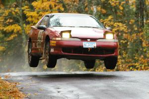 Dave LaFavor / Chris Huntington	Eagle Talon catches decent air at the midpoint jump on Brockway, SS10.