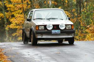 Chris Wilke / Mike Wren VW Rabbit keeps to the pavement at the midpoint jump on Brockway, SS10.