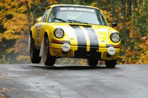 Bob Cutler / John Atsma Porsche 911S gets the right side light at the midpoint jump on Brockway, SS10.