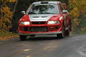 John Rek / Rob Dupree Mitsubishi Lancer Evo 6.5 keeps to the pavement at the midpoint jump on Brockway, SS10.