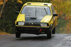 Eric Mozer / Jay Efting	Alfa Romeo Milano catches a few inches of air at the midpoint jump on Brockway, SS10.