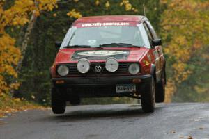 Dave Grenwis / Dan Goldman VW GTI catches some air at the midpoint jump on Brockway, SS10.