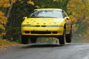 Kyle Sarasin / Stuart Sarasin Eagle Talon catch a few inches of air at the midpoint jump on Brockway, SS10.