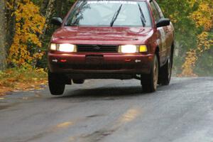 Rob Stroik/ Ross Wegge Nissan Sentra SE-R lifts the right side slightly at the midpoint jump on Brockway, SS10.