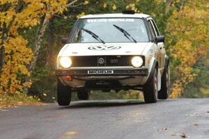 Brett Fairbanks / Chris Greenhouse VW Rabbit catch a couple inches of air at the midpoint jump on Brockway, SS10.