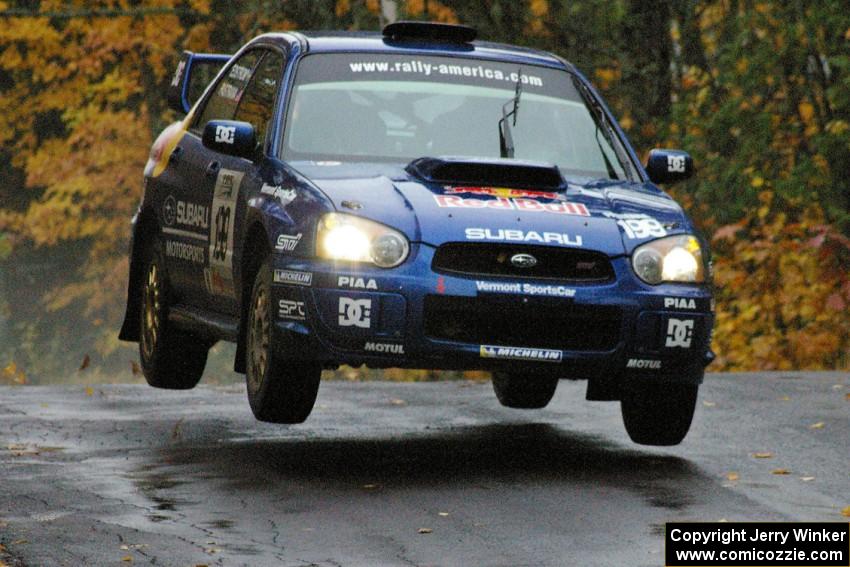 Travis Pastrana / Christian Edstrom Subaru WRX STi catches decent air at the midpoint jump on Brockway, SS10.