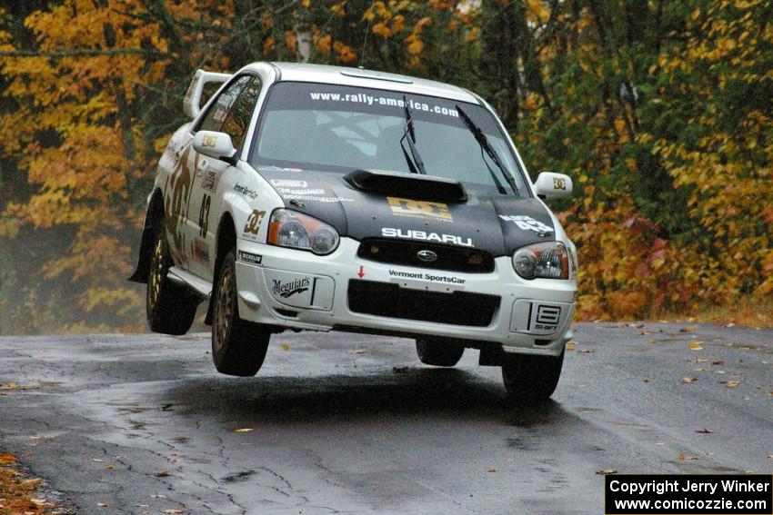 Ken Block / Alex Gelsomino Subaru WRX STi gets airborne at the midpoint jump on Brockway, SS10.