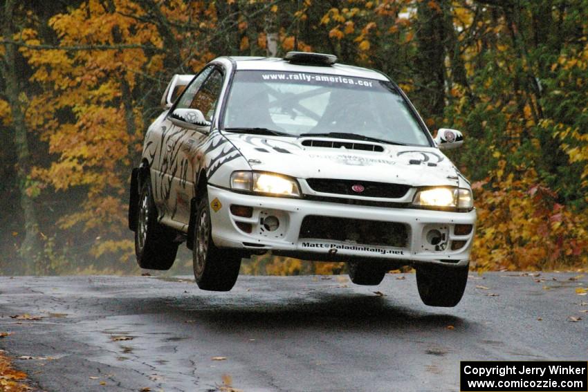Matt Iorio / Ole Holter Subaru Impreza catches decent air at the midpoint jump on Brockway, SS10.