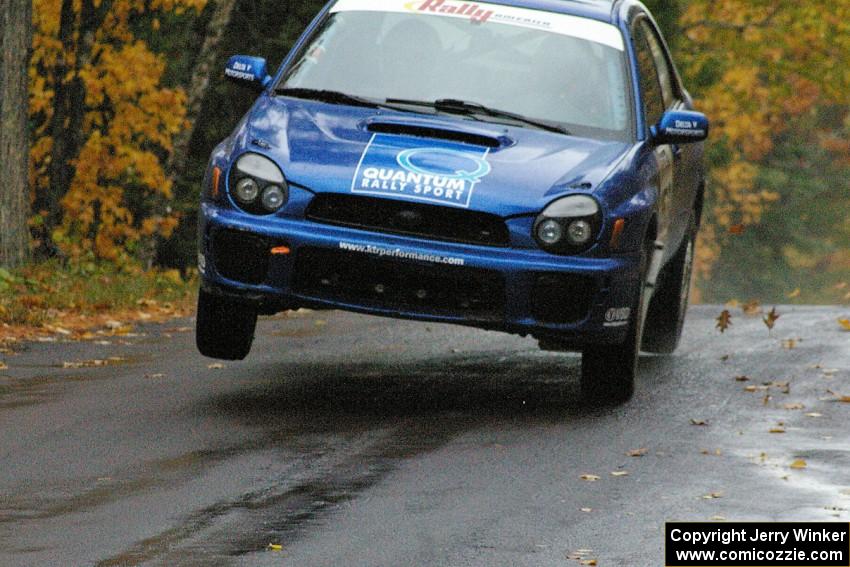 Mark McElduff / Damien Irwin Subaru WRX STi at the midpoint jump on Brockway, SS10.