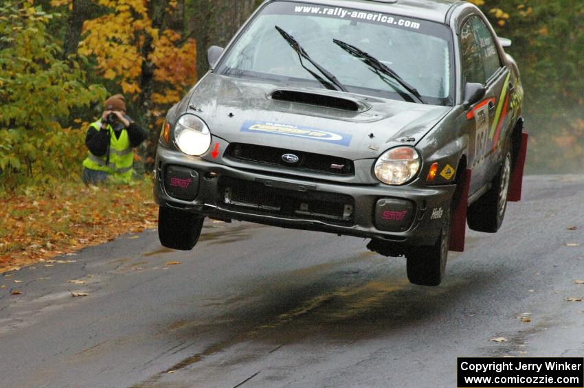 Dave Anton / Alan Ockwell Subaru WRX STi gets a bit crooked before landing at the midpoint jump on Brockway, SS10.