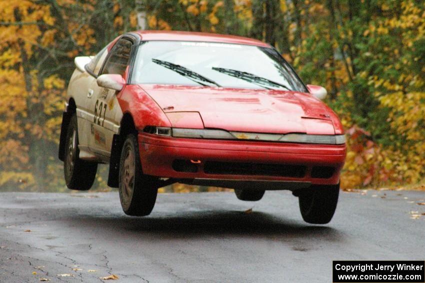 Marcin Kowalski / Maciej Sawicki Mitsubishi Eclipse GST catches decent air at the midpoint jump on Brockway, SS10.