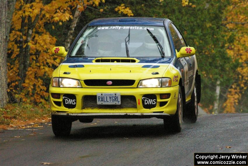 Joan Hoskinson / Jimmy Brandt Subaru Impreza RS gets the backend light at the midpoint jump on Brockway, SS10.