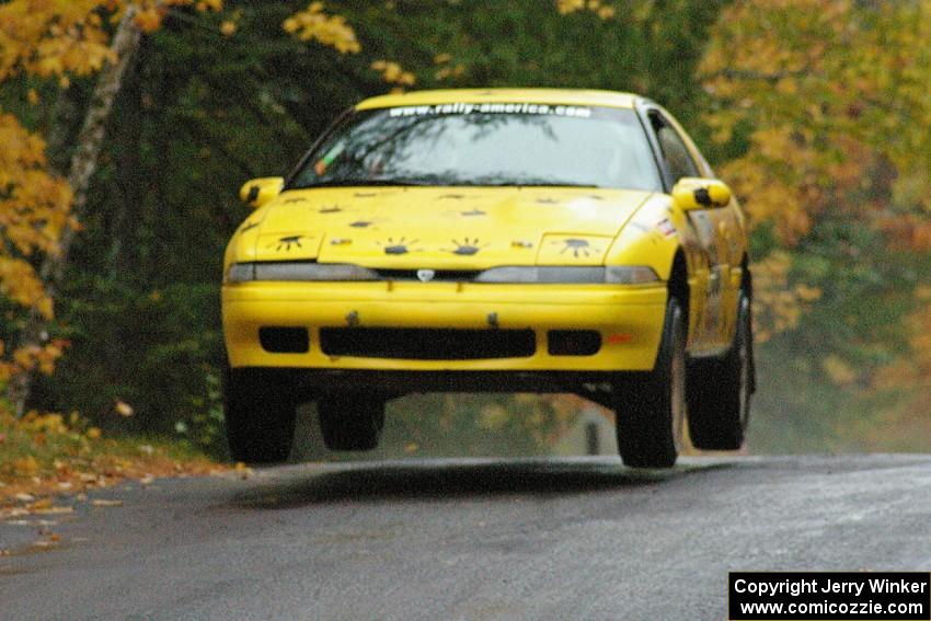 Kyle Sarasin / Stuart Sarasin Eagle Talon catch a few inches of air at the midpoint jump on Brockway, SS10.