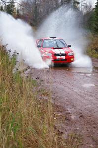 Pat Richard / Nathalie Richard Subaru WRX STi hits the final puddle on Gratiot Lake 2 to claim the 2005 championship.