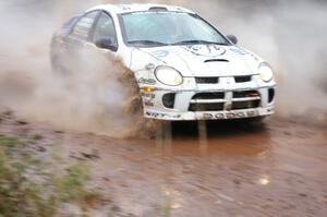 Doug Shepherd / Pete Gladysz Dodge SRT-4 hits the final big puddle at the end of Gratiot Lake 2, SS14, at speed.