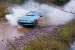 Adam Markut / John Nordlie Eagle Talon TSI hits the final big puddle at the end of Gratiot Lake 2, SS14, at speed.