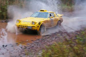 Jake Himes / Matt Himes	Mazda RX-7 hits the final big puddle at the end of Gratiot Lake 2, SS14, at speed.
