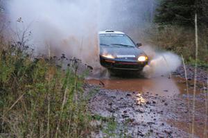 Matt Johnston / Alex Kihurani Honda Civic hits the final big puddle at the end of Gratiot Lake 2, SS14, at speed.