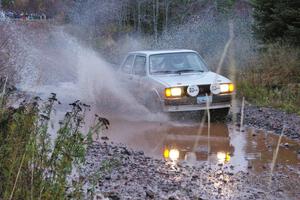Chris Wilke / Mike Wren VW Rabbit hits the final big puddle at the end of Gratiot Lake 2, SS14, at speed.