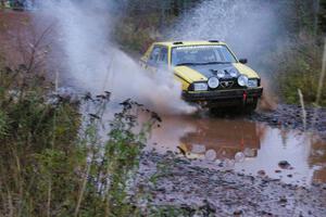 Eric Mozer / Jay Efting	Alfa Romeo Milano hits the final big puddle at the end of Gratiot Lake 2, SS14, at speed.