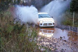 Ryan Haveman / Josh Van Den Heuvel Dodge Neon SRT-4 hits the final big puddle at the end of Gratiot Lake 2, SS14, at speed.