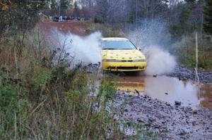 Kyle Sarasin / Stuart Sarasin Eagle Talon hits the final big puddle at the end of Gratiot Lake 2, SS14, at speed.